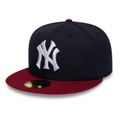 Pictured is this MLB Cooperstown New York Yankees 59FIFTY Fitted cap in navy & dark red. 4