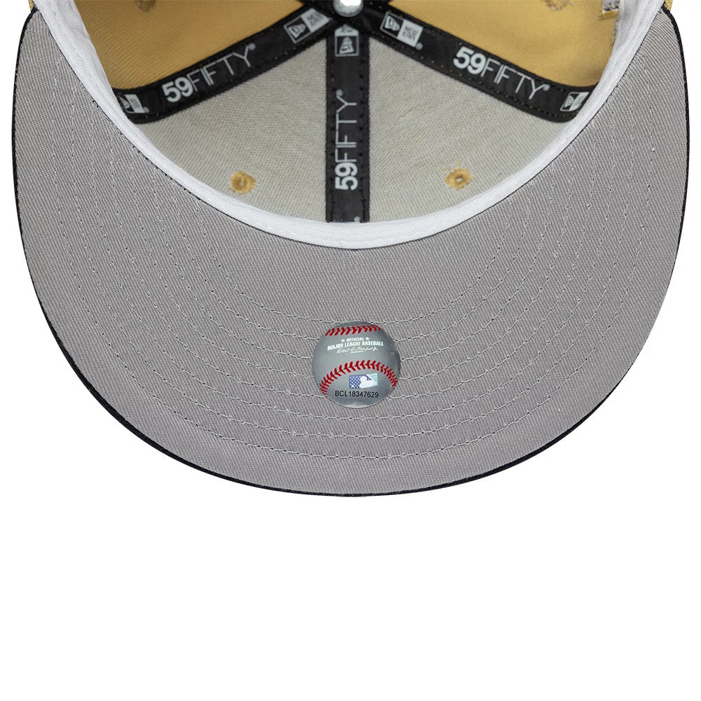 Pictured is this MLB Vegas Gold Cleveland Indians 59FIFTY Fitted cap in gold. 2