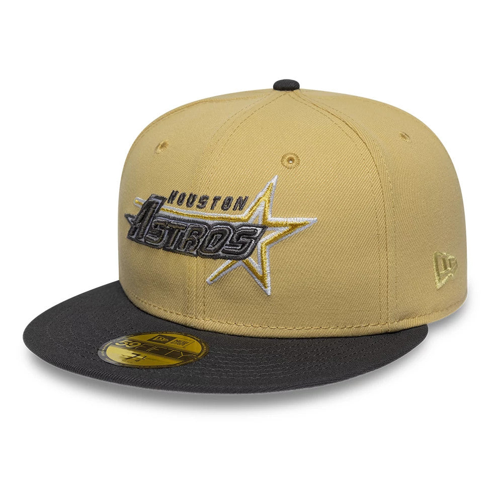Houston Astros MLB Vegas Gold New Era 59FIFTY Fitted Cap, front view showing the raised embroidered Astros logo in black and white with a star on the gold crown, a contrasting black flat visor, and a gold 59FIFTY size sticker.