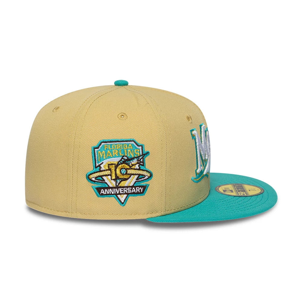 Pictured is this MLB Vegas Gold Florida Marlins 59FIFTY Fitted cap in gold & black. 5