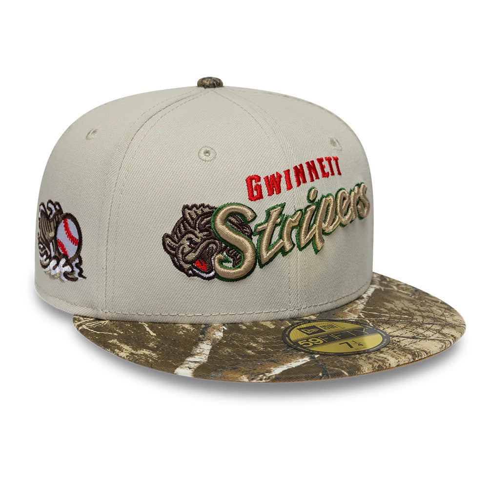 Pictured is this MiLB Hometown Gwinnett Stripers Sidepatch 59FIFTY Fitted cap in Beige. 1