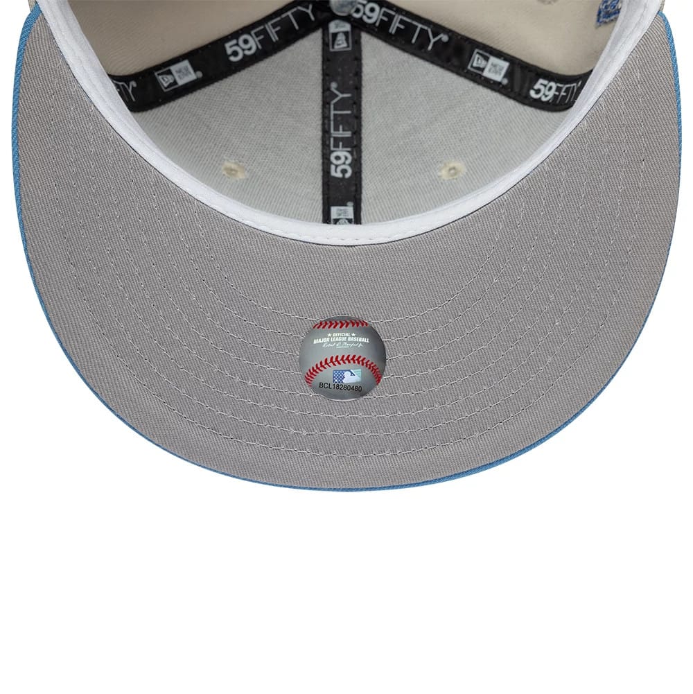 Pictured is this MLB Cooperstown Houston Astros 59FIFTY Fitted cap in beige & blue. 2