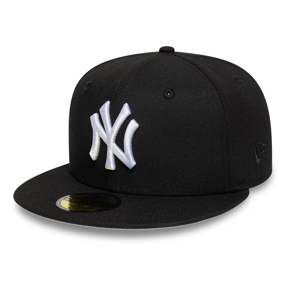 New York Yankees MLB Cooperstown Black New Era 59FIFTY Fitted Cap, front view showing the raised white embroidered NY logo on the black structured crown, complete with the flat black visor and gold 59FIFTY size sticker on the visor.