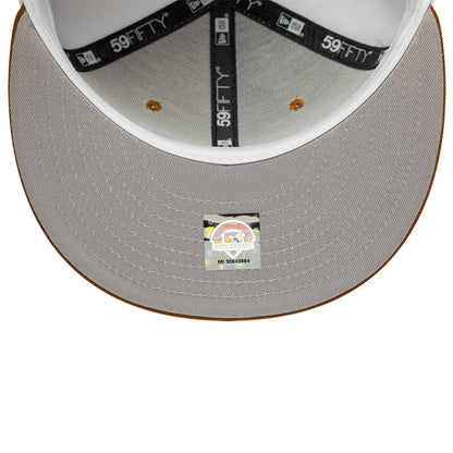 Pictured is this MiLB Pinwheel Lake Elsinore Storm 59FIFTY Fitted cap in Cream. 2
