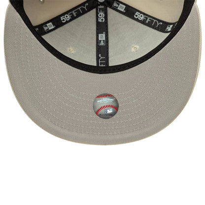 Pictured is this MLB Atlanta Braves 59FIFTY Fitted cap in beige. 2