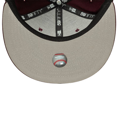 Pictured is this MLB Chicago White Sox 59FIFTY Fitted cap in dark purple. 2