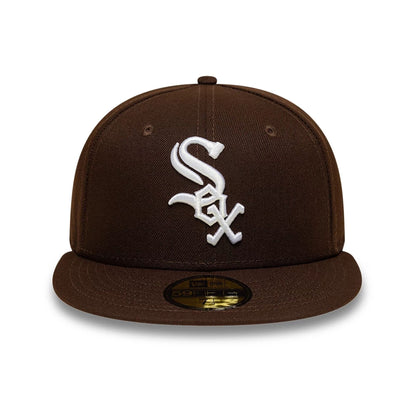 Pictured is this MLB Chicago White Sox 59FIFTY Fitted cap in dark brown. 3