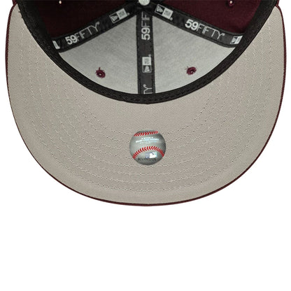 Pictured is this MLB New York Yankees 59FIFTY Fitted cap in dark purple. 2