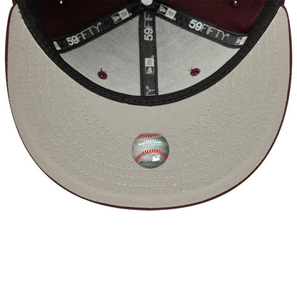 Pictured is this MLB New York Yankees 59FIFTY Fitted cap in dark purple. 2