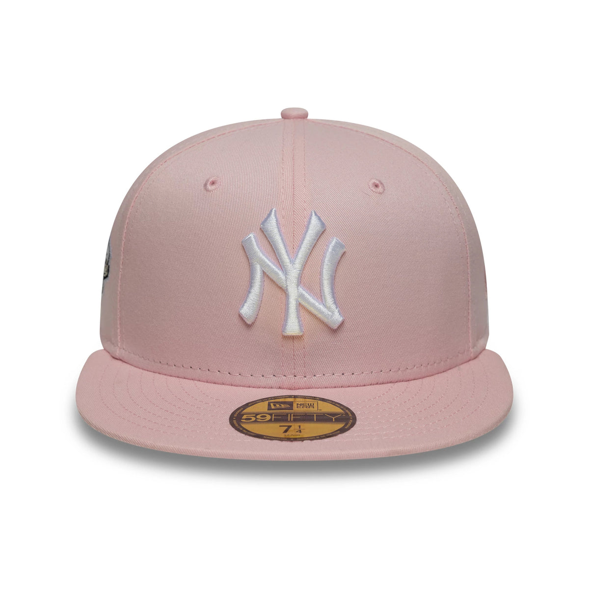 New York Yankees MLB World Series Pink New Era 59FIFTY Fitted Cap, front view showing a raised white NY logo embroidered on the front panel, complemented by a flat pink visor and a gold 59FIFTY size sticker centred on the visor.