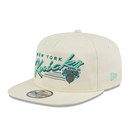 This is a New York Knicks NBA Cream Golfer Adjustable Cap 1