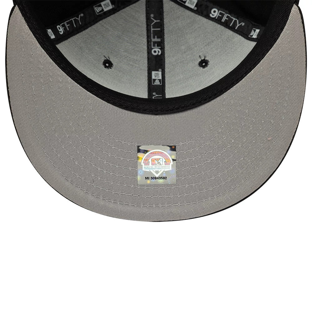Lake Elsinore Storm MiLB Pinwheel Black New Era 9FIFTY Snapback Cap, inside view showing grey undervisor with a reflective size sticker centrally placed, black internal taping featuring multiple 9FIFTY logos, and contrasting black sweatband.