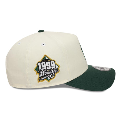 Pictured is this MLB World Series New York Yankees 9FORTY A-Frame cap in cream and dark green. 5