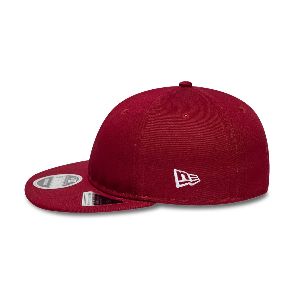 New Era Red Retro Crown New Era 9FIFTY Snapback Adjustable Cap, side view showing the white embroidered New Era flag logo on the left side of the structured red crown, with a flat visor and a 9FIFTY size sticker on the top.