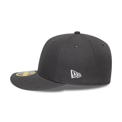 New Era Grey Low Profile 59FIFTY Fitted Cap, side view showing the white embroidered New Era flag logo on the left side panel, with a structured grey crown, curved visor, and a gold 59FIFTY size sticker on the visor.