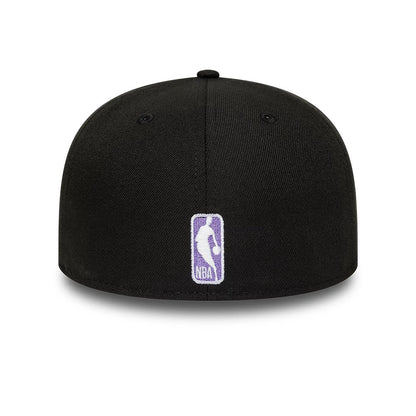 LA Lakers NBA Flat Black New Era 59FIFTY A-Frame Fitted Cap, rear view showing the purple and white embroidered NBA logo at the centre of the back panels, set low on the structured black crown and featuring black eyelets.