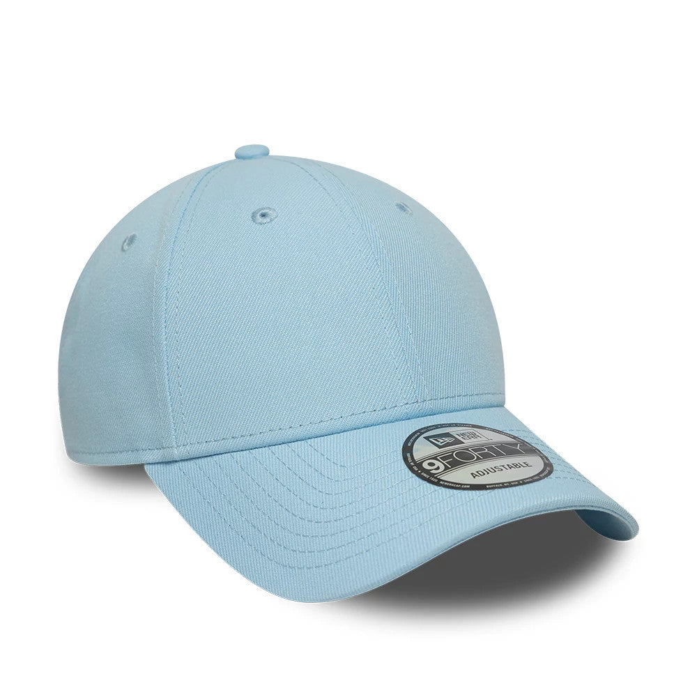 New Era Blue 9FORTY Adjustable Cap, three-quarter view with embroidered eyelets on each panel, a matching blue top button, and a black and silver 9FORTY size sticker on the slightly curved visor.