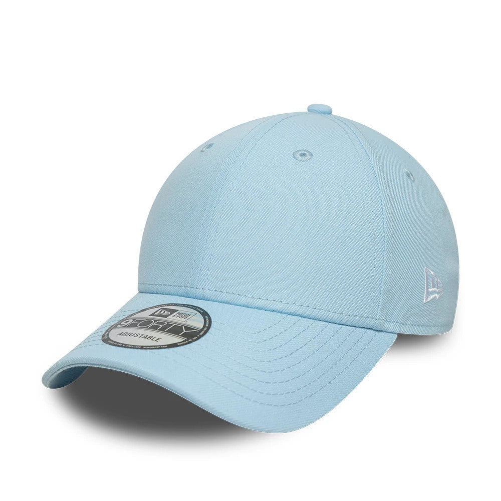 New Era Blue 9FORTY Adjustable Cap, three-quarter view showing the white embroidered New Era flag logo on the left side, curved blue visor with stitching, and a 9FORTY size sticker centrally placed on the visor.