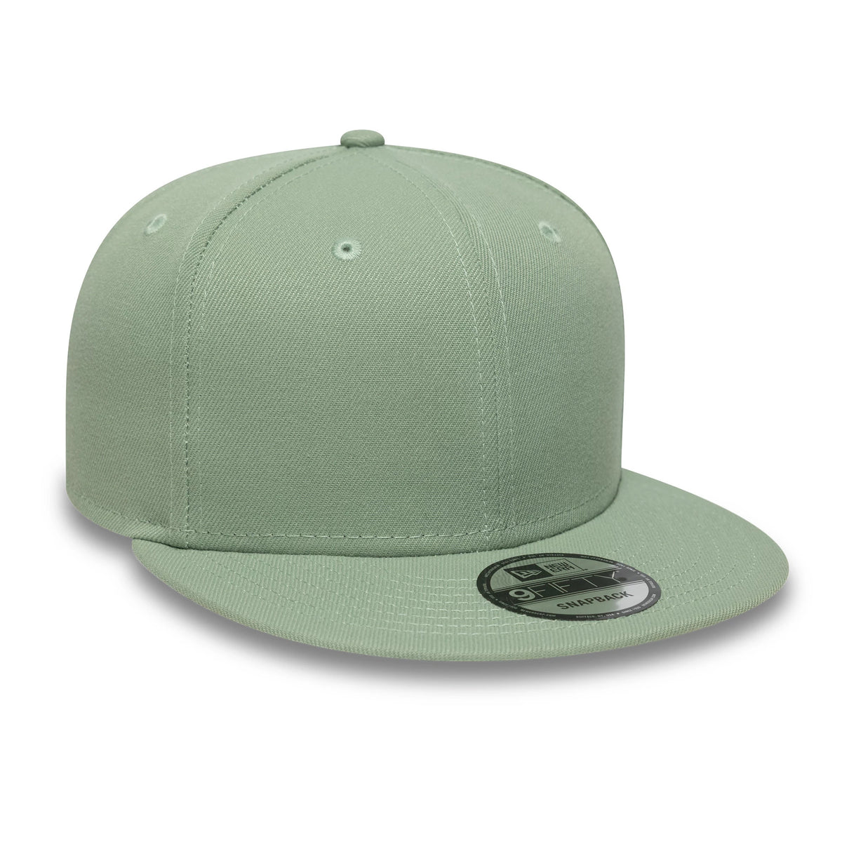 New Era Green 9FIFTY Snapback Adjustable Cap, three-quarter view showing a structured green crown and a matching flat visor, both with stitching and embroidered eyelets, featuring a black 9FIFTY size sticker on the visor.