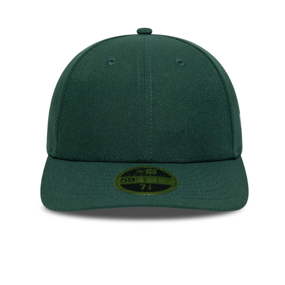 New Era Dark Green Low Profile 59FIFTY Fitted Cap, front view showing a structured dark green crown with matching dark green visor, topped with a small top button and featuring a gold 59FIFTY size sticker centred on the visor.