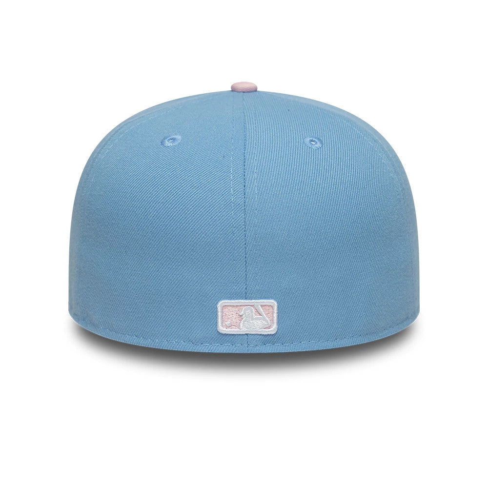 New York Yankees MLB Pastel Blue New Era 59FIFTY Fitted Cap, rear view showing the pink embroidered MLB Batterman logo at the centre of the structured pastel blue crown, with matching pastel blue eyelets and a top button.