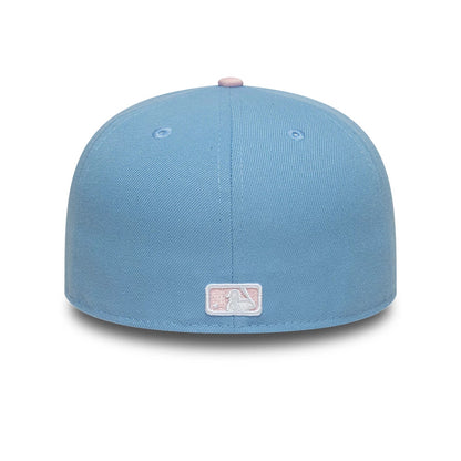 New York Yankees MLB Pastel Blue New Era 59FIFTY Fitted Cap, rear view showing the pink embroidered MLB Batterman logo at the centre of the structured pastel blue crown, with matching pastel blue eyelets and a top button.