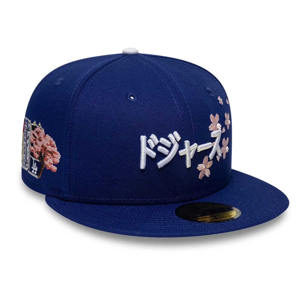 Pictured is this MLB Kanji LA Dodgers 59FIFTY Fitted cap in dark blue. 1