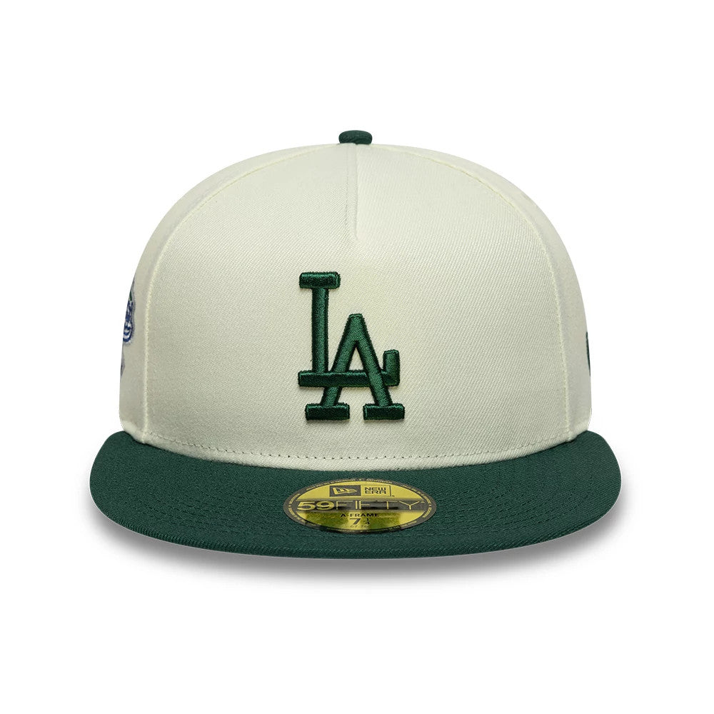 LA Dodgers MLB Cream New Era 59FIFTY A-Frame Fitted Cap, front view showing a dark green embroidered LA logo on the front panel, complemented by a matching dark green visor and a gold 59FIFTY size sticker on the visor.