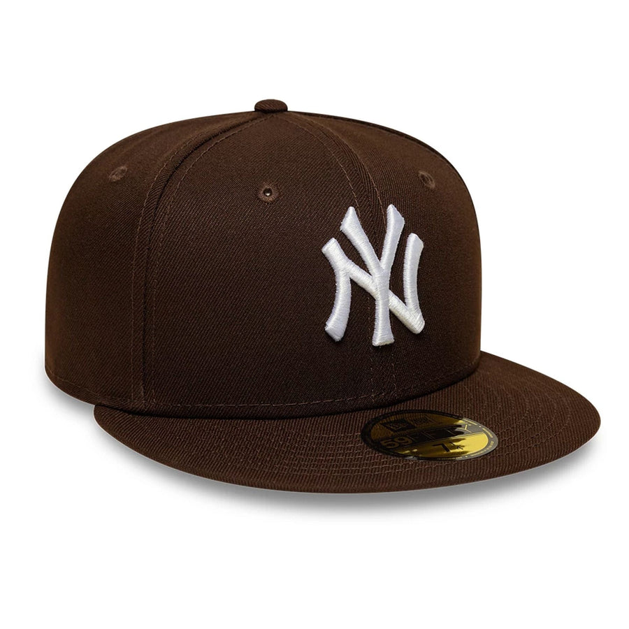 Pictured is this MLB New York Yankees 59FIFTY Fitted cap in dark brown. 4