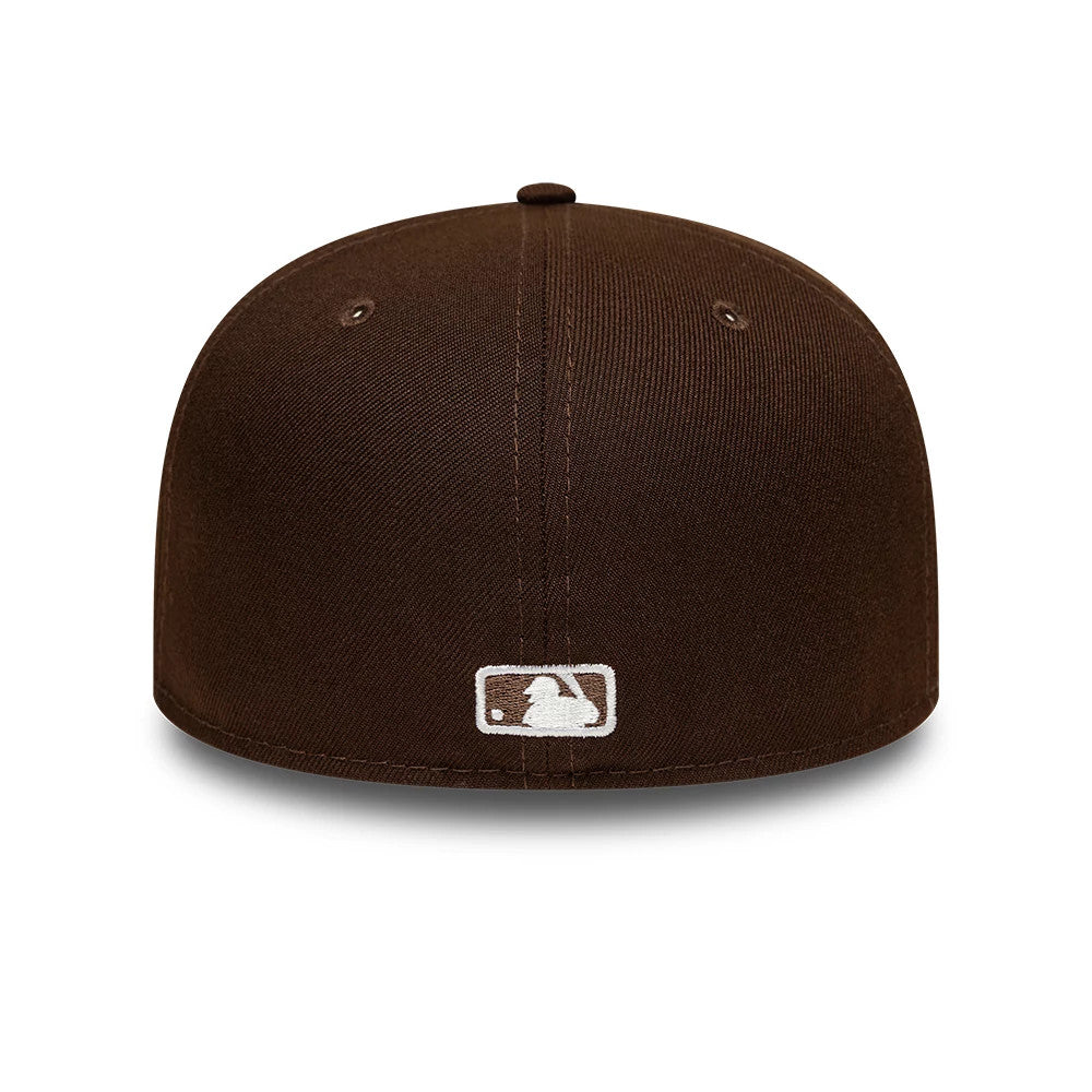 New York Yankees MLB Dark Brown New Era 59FIFTY Fitted Cap, rear view showing the white embroidered MLB Batterman logo centred on the dark brown structured crown, with two brown eyelets and a matching top button for a finish.