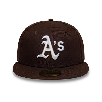 Pictured is this MLB Athletics 59FIFTY Fitted cap in dark brown. 3