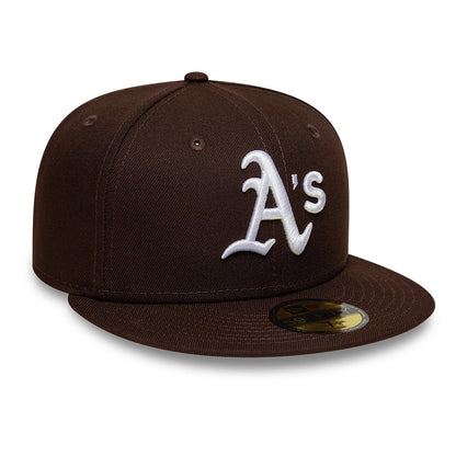 Athletics MLB Dark Brown New Era 59FIFTY Fitted Cap, front view showing the white raised embroidered A's logo on the front panel, a flat dark brown visor, and a gold 59FIFTY size sticker on the top of the visor.