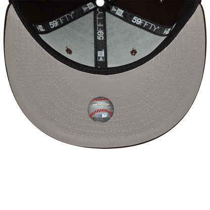 Athletics MLB Dark Brown New Era 59FIFTY Fitted Cap, inside view showing black 59FIFTY taping along the seams, a dark brown sweatband, and a grey undervisor with a baseball graphic sticker at the centre, through the cap.