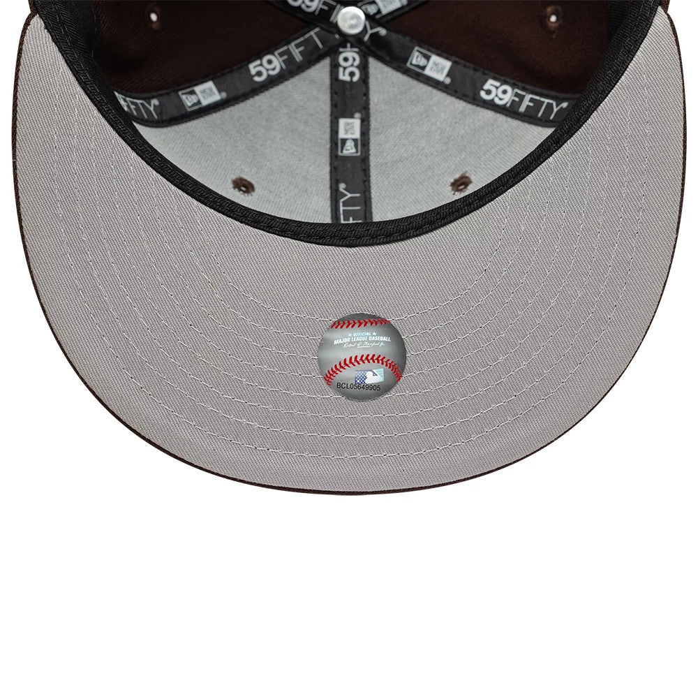 Detroit Tigers MLB Dark Brown New Era 59FIFTY Fitted Cap, inside view showing the grey undervisor with a central baseball graphic sticker, black branded taping along the seams, and a white sweatband for added comfort.