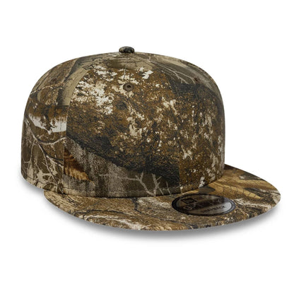 Pictured is this New Era Real Tree 9FIFTY Snapback cap in beige. 3