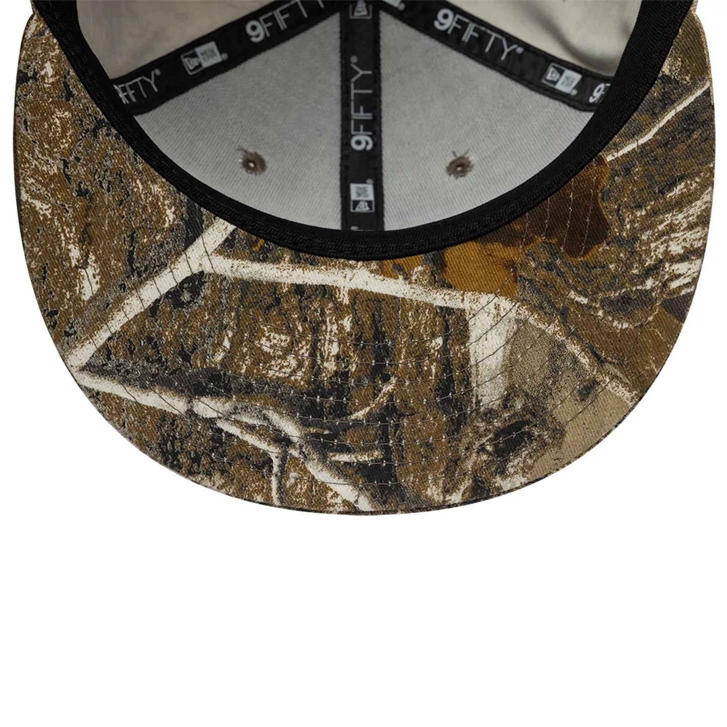 Pictured is this New Era Real Tree 9FIFTY Snapback cap in beige. 7