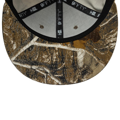 Pictured is this New Era Real Tree 9FIFTY Snapback cap in beige. 7