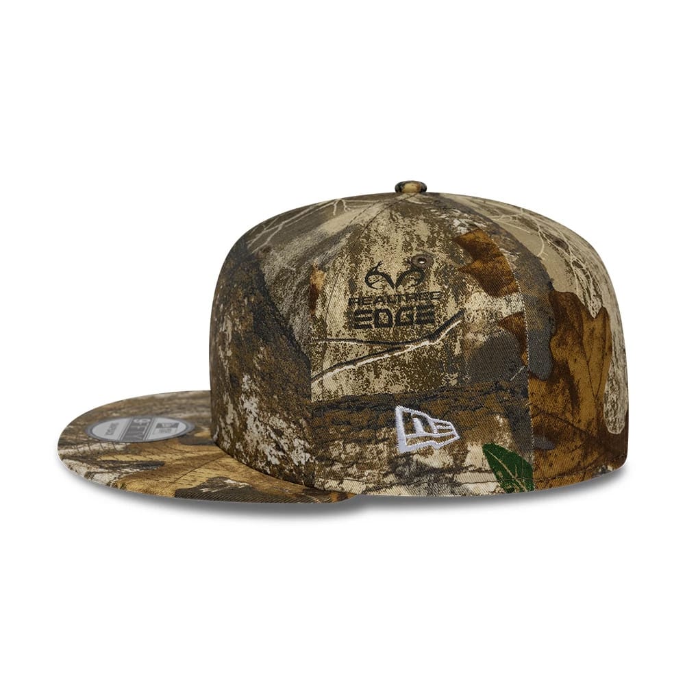 Pictured is this New Era Real Tree 9FIFTY Snapback cap in beige. 4