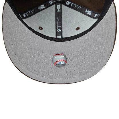 Pictured is this MLB Kanji LA Dodgers 9FIFTY Snapback Adjustable cap in dark brown. 2