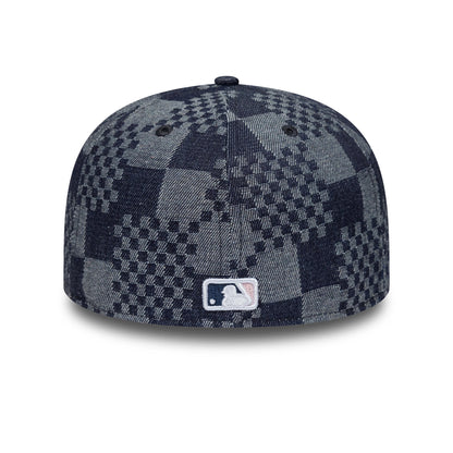 New York Yankees MLB Denim Blue New Era 59FIFTY Fitted Cap, rear view showing the embroidered MLB Batterman logo at the centre back, with a unique checkerboard denim pattern on the structured crown and dark blue eyelets.