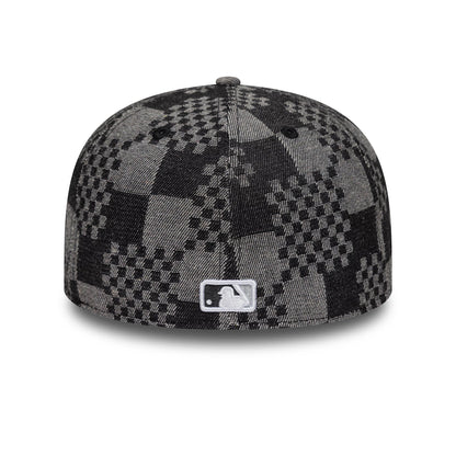 LA Dodgers MLB Denim Black New Era 59FIFTY Fitted Cap, rear view showing an intricate black and grey checkered pattern across the crown, with the white embroidered MLB Batterman logo centred at the bottom of the back panels.