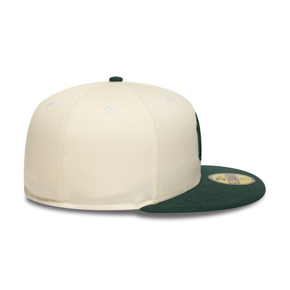 Pictured is this MLB New York Yankees 59FIFTY Fitted cap in cream and dark green. 6