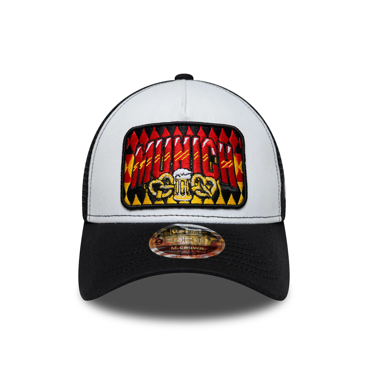 Pictured is this New Era Munich 9FORTY M-Crown A-Frame Trucker cap in white & black. 2