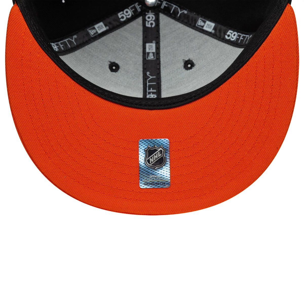 Pictured is this NHL London Game 2026 Philadelphia Flyers 59FIFTY Fitted cap in black and orange. 7