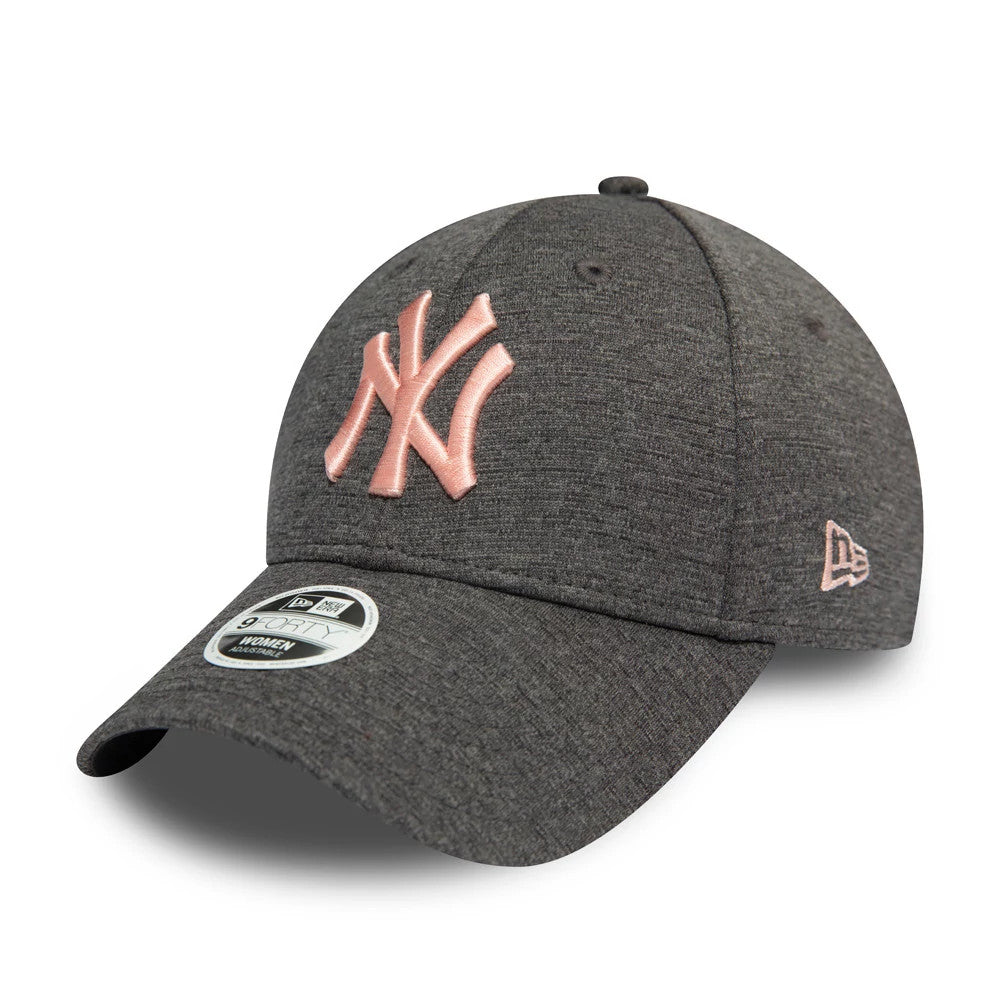 New York Yankees Womens Tech Grey New Era 9FORTY Cap, three-quarter view showing a raised pink embroidered NY logo on the front panel, a curved grey visor with a 9FORTY size sticker, and the matching pink New Era flag logo on the left side.