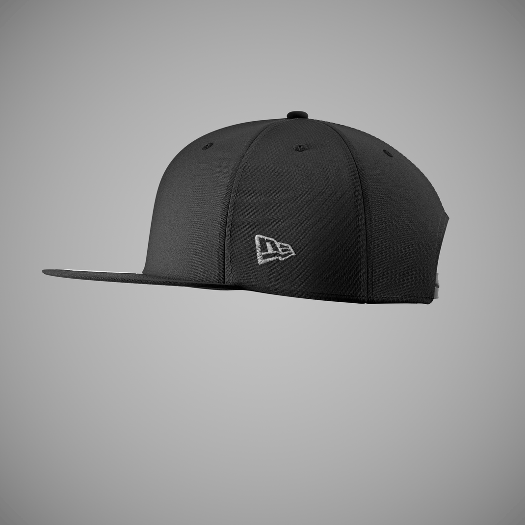 A black flat-brim 9FIFTY cap with a white embroidered New Era Flag on the side, shown against a neutral gray background.