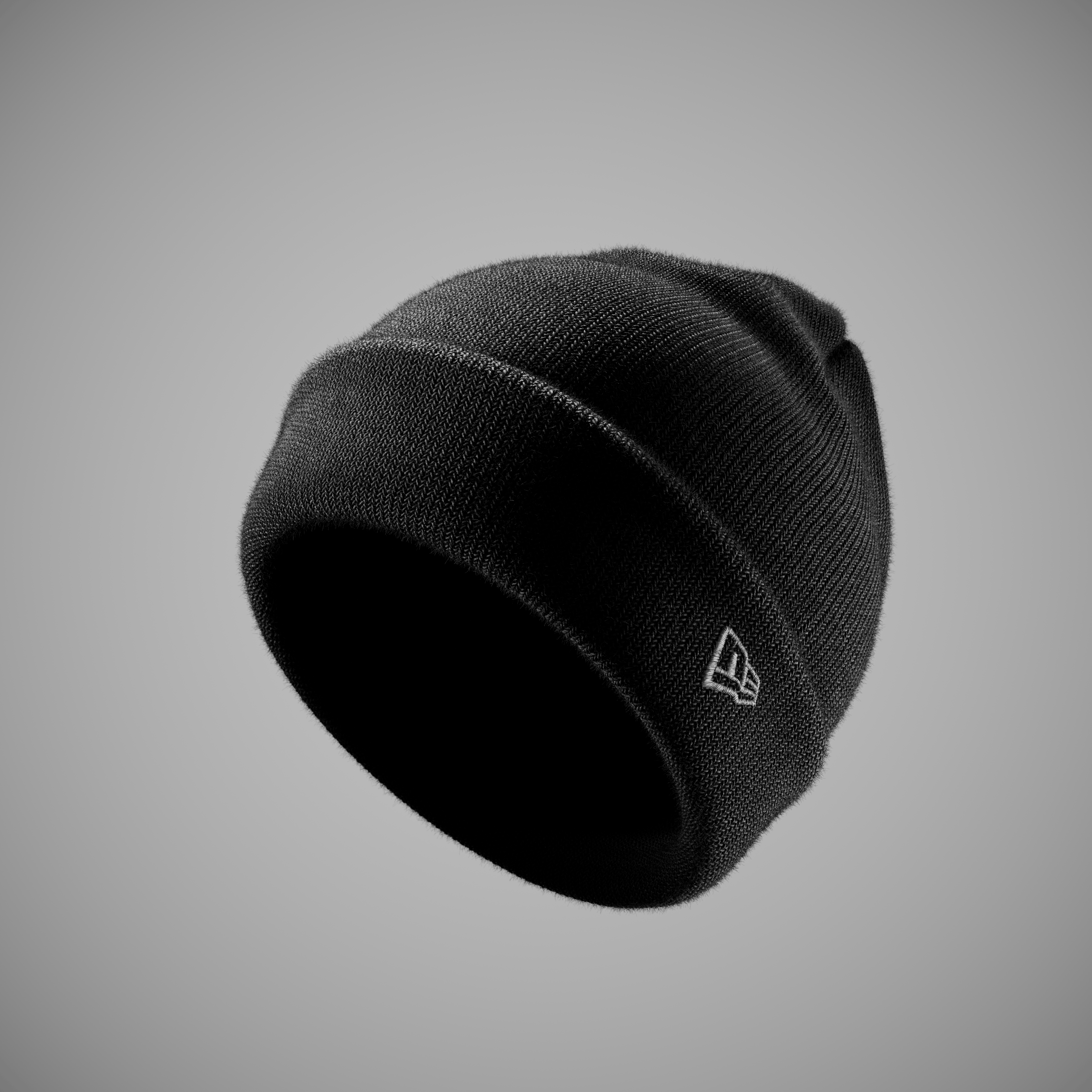 Black beanie with a logo on a gray background