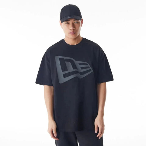 Slide 8:Person wearing a black t-shirt with a logo and a cap on a white background