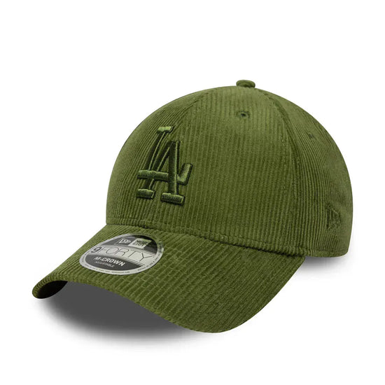 Slide 1:Green baseball cap with a logo on a white background