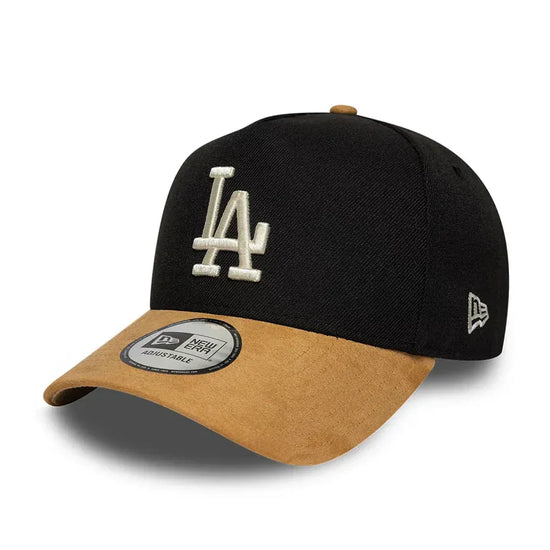 Slide 3:Black and brown baseball cap with LA Dodgers logo on a white background